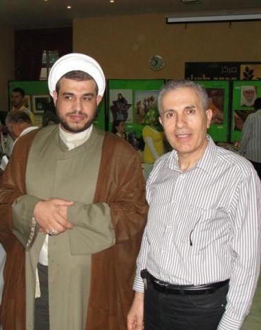 الشيخ محمد قانصو والأستاذ عزت رشيدي خلال أحد الأنشطة الثقافية