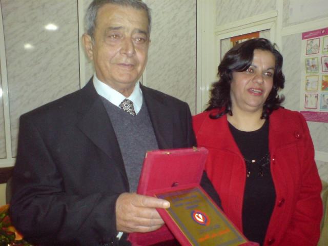 أم سلام وأبو سلام حليم القسيس يوم تكريمه في مؤسسة عامل
