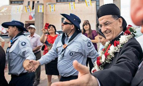 أحد أبرز دعاة تجنيد العرب في صفوف العدو استقبل الراعي أمس (أ ف ب)