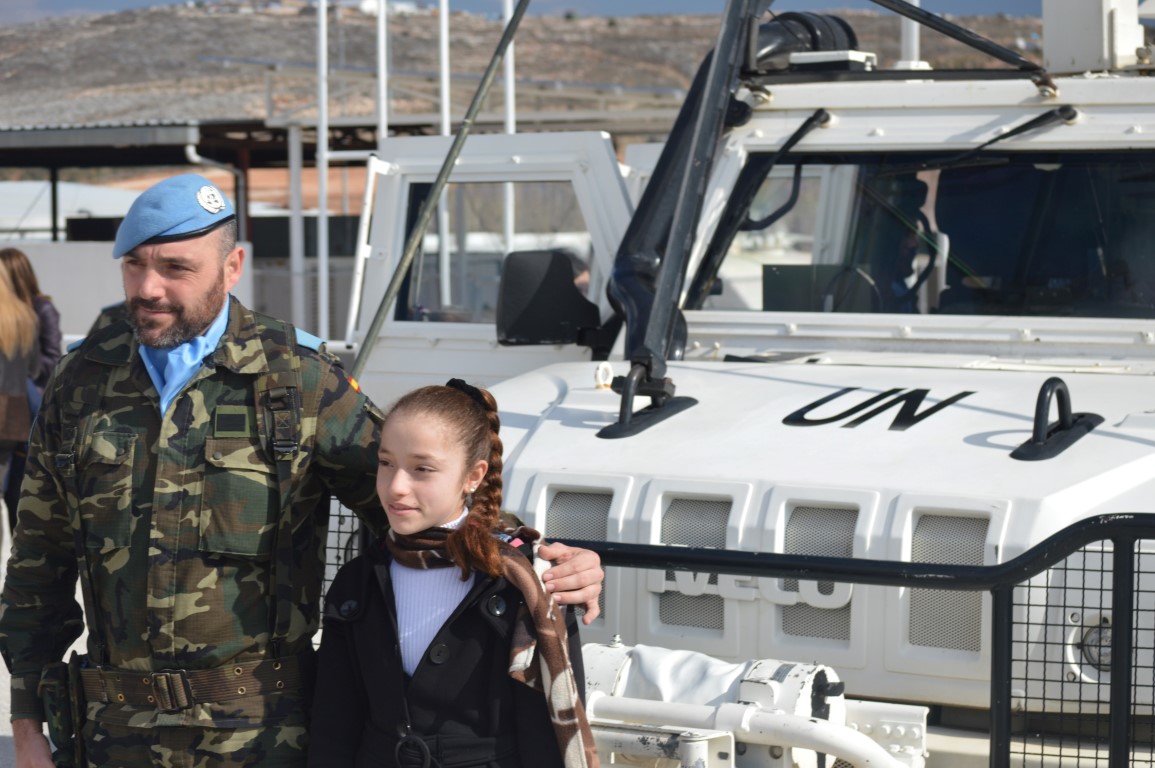 Spanish sargeant with student during visit