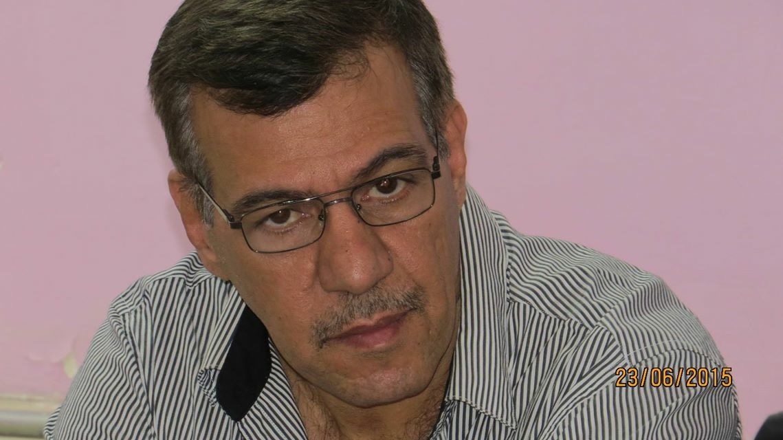 لأديب الناقد عباس داخل حسن